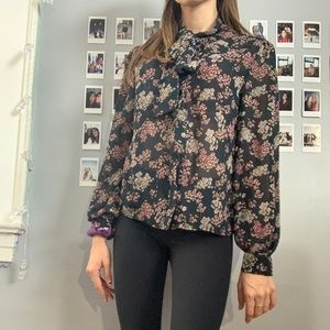 Green and floral blouse